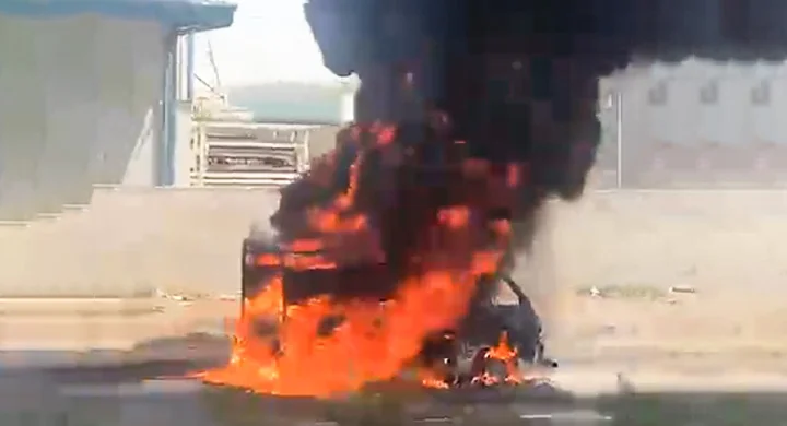 Burning tempo on ahmedabad mumbai highway near smiten chocolate factory