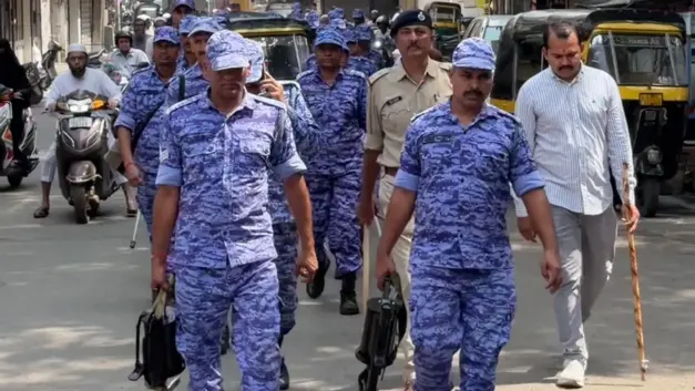 Surat Police Conduct Joint Foot Patrols With Raf During Ganeshotsav Surat police conduct joint foot patrols with raf during ganeshotsav